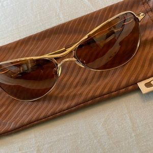 Gold Oakley sunglasses